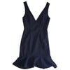 Black dress with a V-neck and ruffled hem on a white background