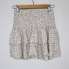 Luvalot Cream leopard print mini skirt with ruffle detail. Size 6 AU