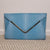 Colette Aqua Blue Snakeskin Clutch with Gold Bar Detail