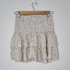 Luvalot Cream leopard print mini skirt with ruffle detail. Size 6 AU