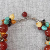 Multi-coloured beaded bracelet with red womensjewellery
