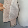 Elegant tweed-style jacket in blush pink with subtle Pink