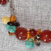 Multi-coloured beaded bracelet with red womensjewellery